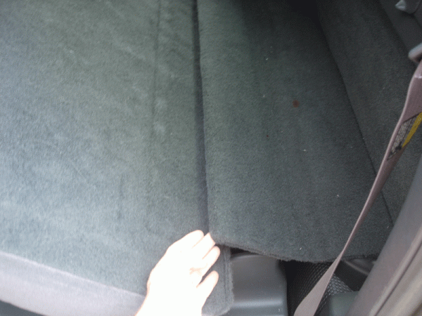 2003-2007 Chevy/GMC Solid flap that is attached to the cab and folds onto the seat